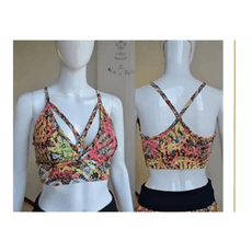 Colorful sports bra with stylish strap design, showcased on a mannequin from the back and side view.